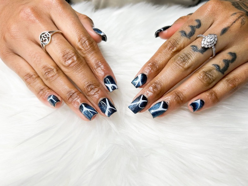Navy shimmer square nails with white line art by TLC Nails and Esthetics in Nottingham, MD