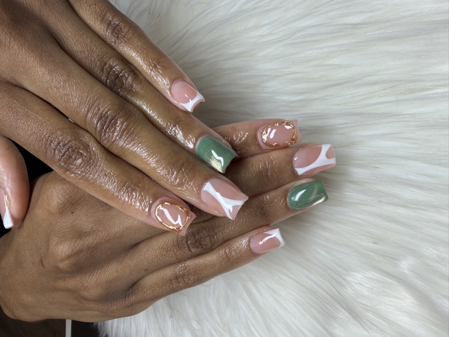 A square Gel X set with sage green shimmer accents and hand-painted white swirls by TLC Nails and Esthetics in Nottingham, MD